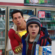 Shazam and Freddy witnessing a robbery.